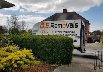 O.E. Removals van waiting outside retford